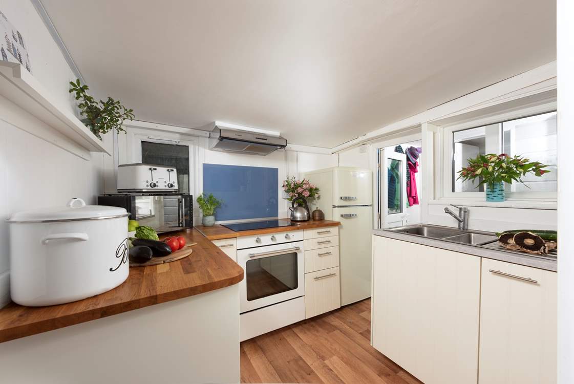 The little cabin kitchen is well-equipped.