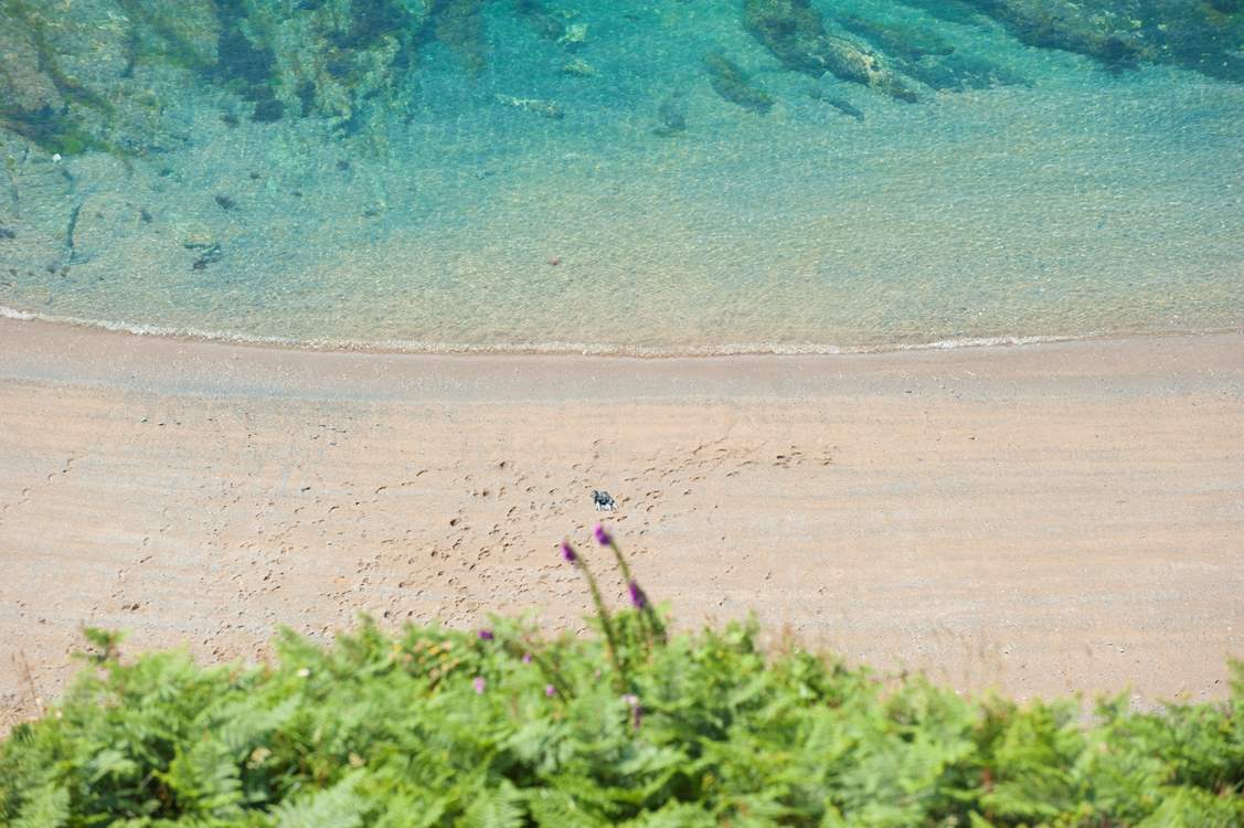 The crystal clear waters below.