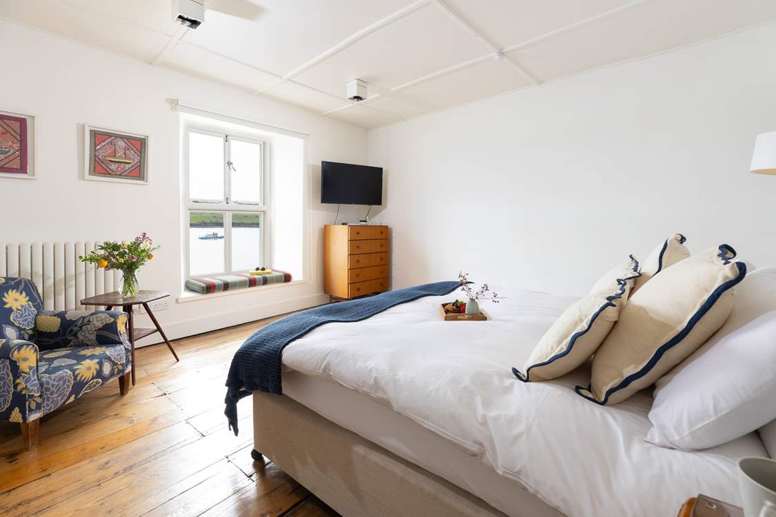 Watch the water world go by from the window seat in charming bedroom 2.