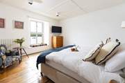 Watch the water world go by from the window seat in charming bedroom 2.