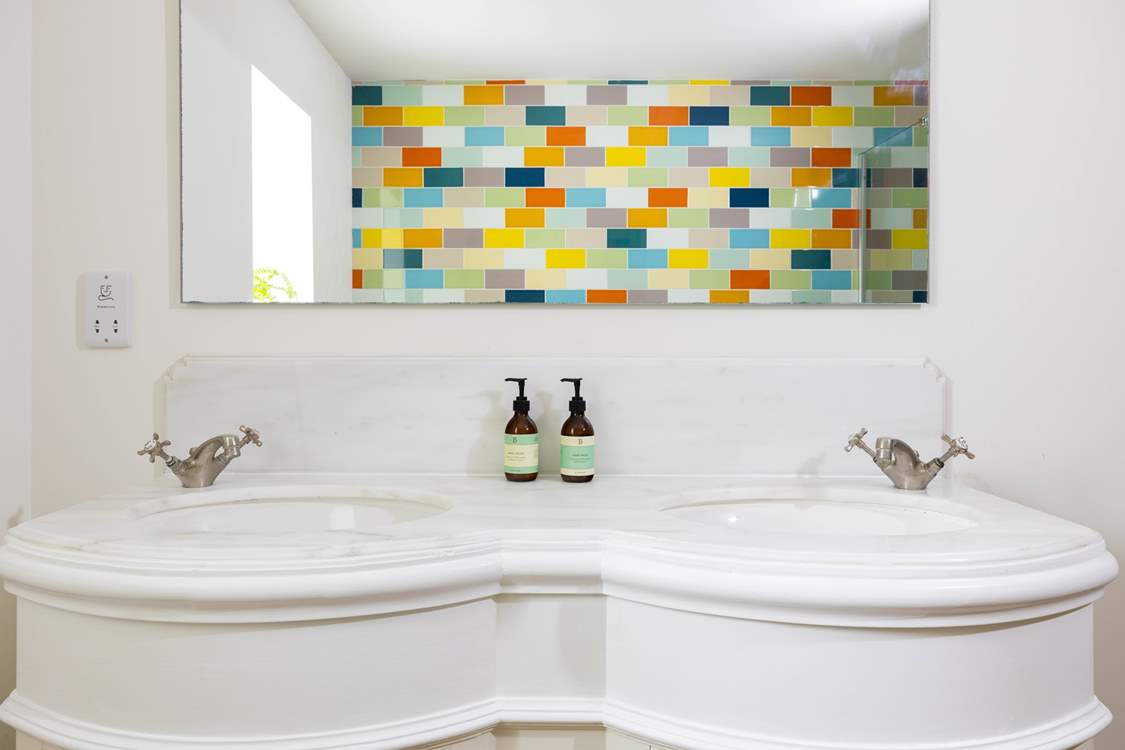With twin wash-basins.