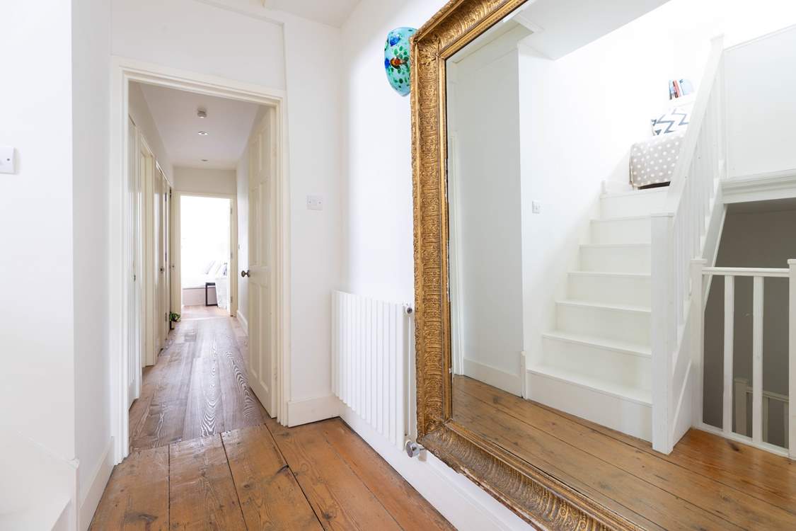 Original floors welcome you throughout.