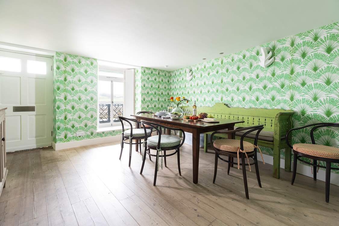 The gorgeous dining-room has views across the bay.