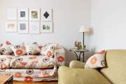 The cosy sitting-room has seating for everyone.