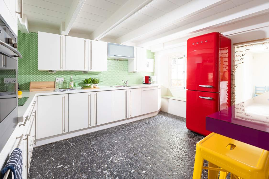 The spacious kitchen has all the equipment you'll need.