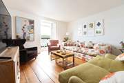 Contemporary furnishings marry beautifully in this traditional holiday home.