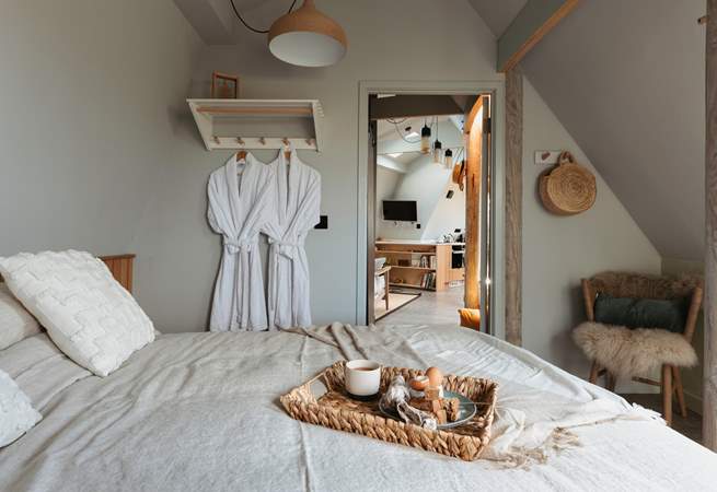 The king-size bed complete with Piglet in Bed bedding pairs perfectly for a restful night's sleep.