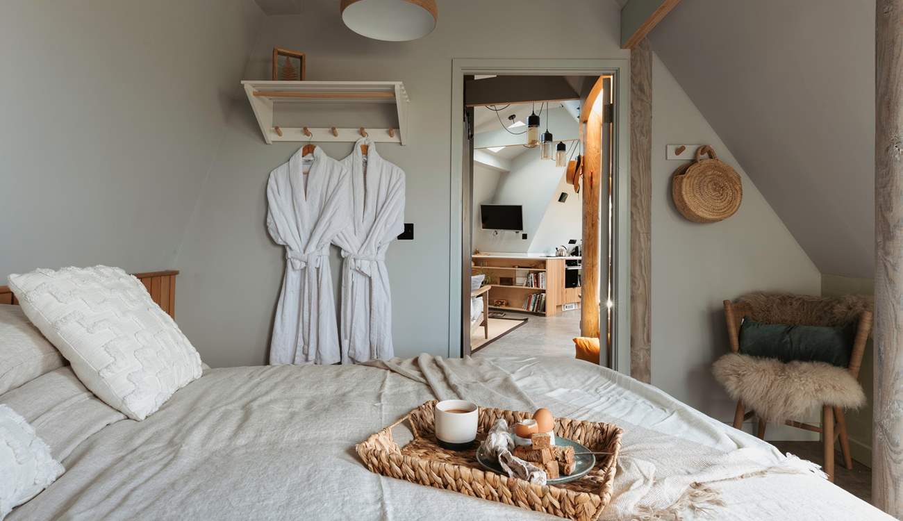 The king-size bed complete with Piglet in Bed bedding pairs perfectly for a restful night's sleep.
