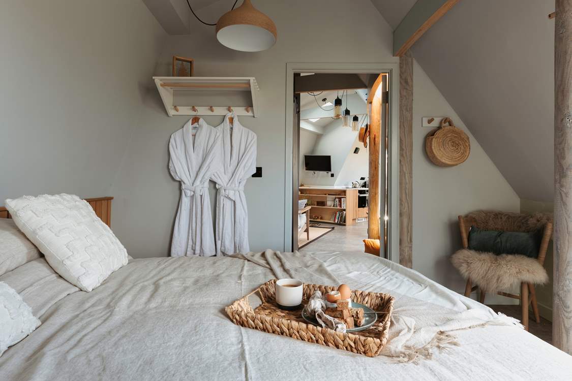 The king-size bed complete with Piglet in Bed bedding pairs perfectly for a restful night's sleep.