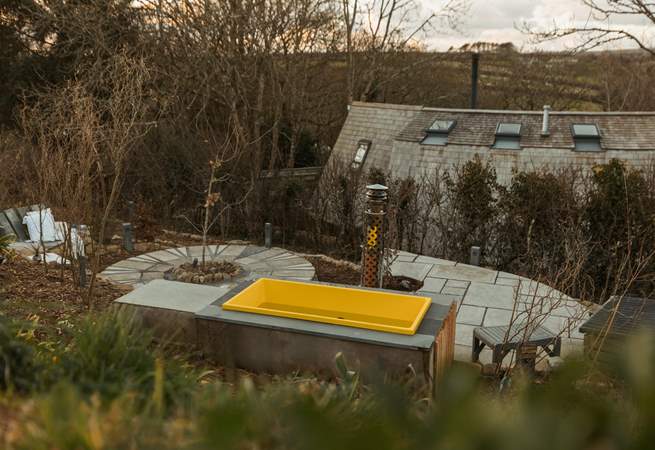 Enjoy a soak in the wood-fired hot tub.