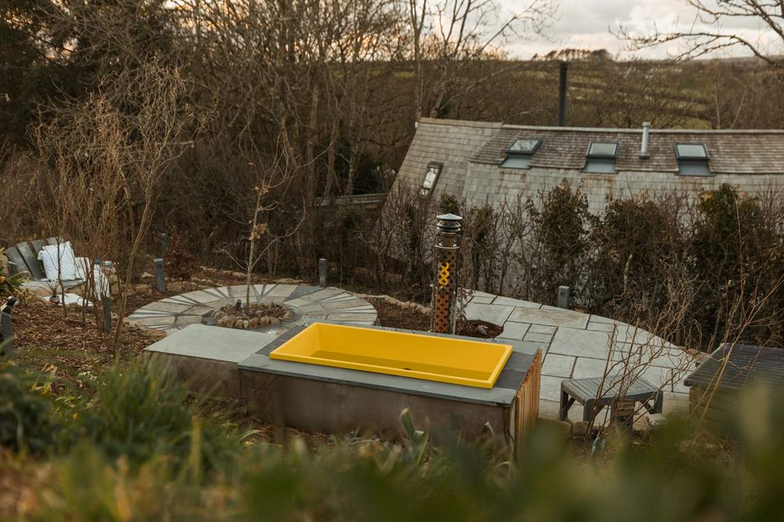 Enjoy a soak in the wood-fired hot tub.