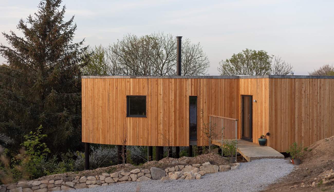 Step out of your larch-clad hideaway and venture up the hill to the shared picnic meadow.