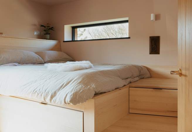 Complete with under-stair storage drawers.