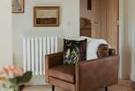 Sink into the sumptuous sofa and leather arm chair.