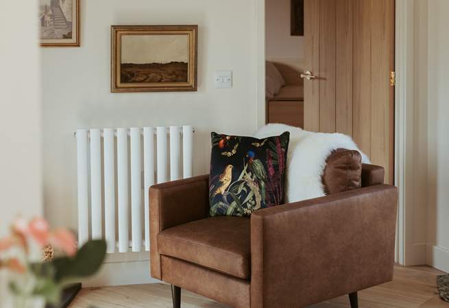 Sink into the sumptuous sofa and leather arm chair.