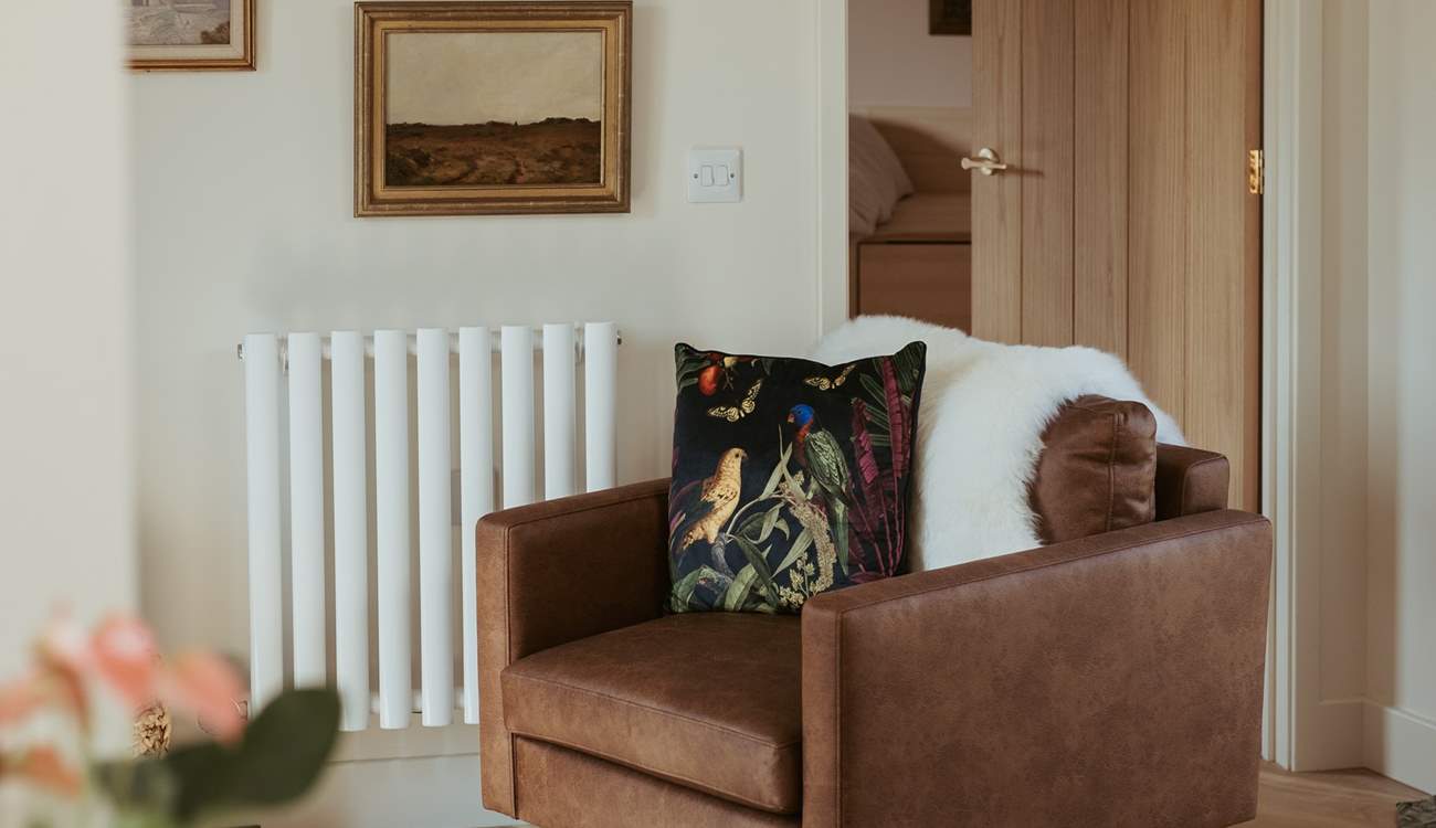 Sink into the sumptuous sofa and leather arm chair.