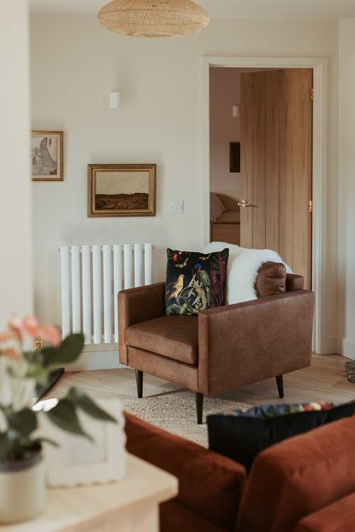 Sink into the sumptuous sofa and leather arm chair.
