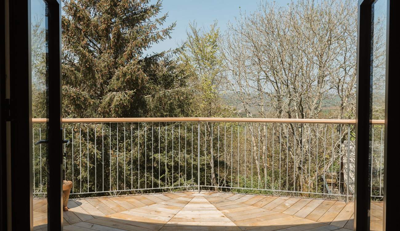 Step out onto your private deck with panoramic views across the canopy.