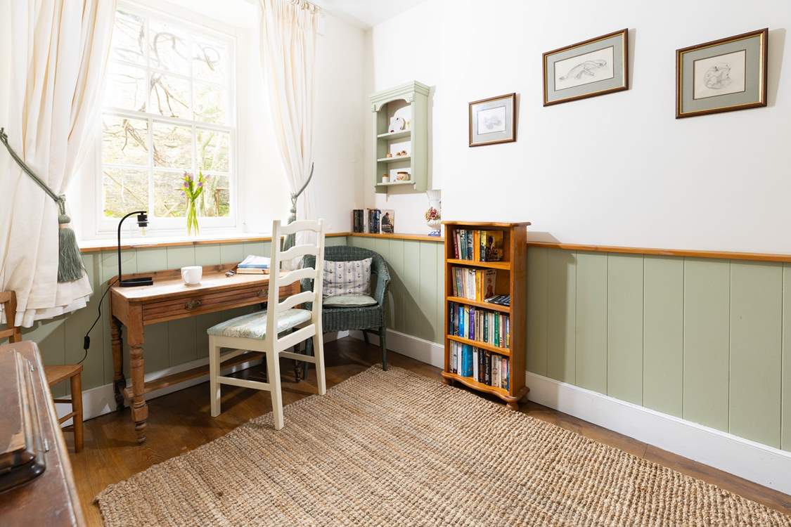 A perfectly placed writing bureau in the study.