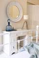 The main bedroom is decorated in cool and calming tones.