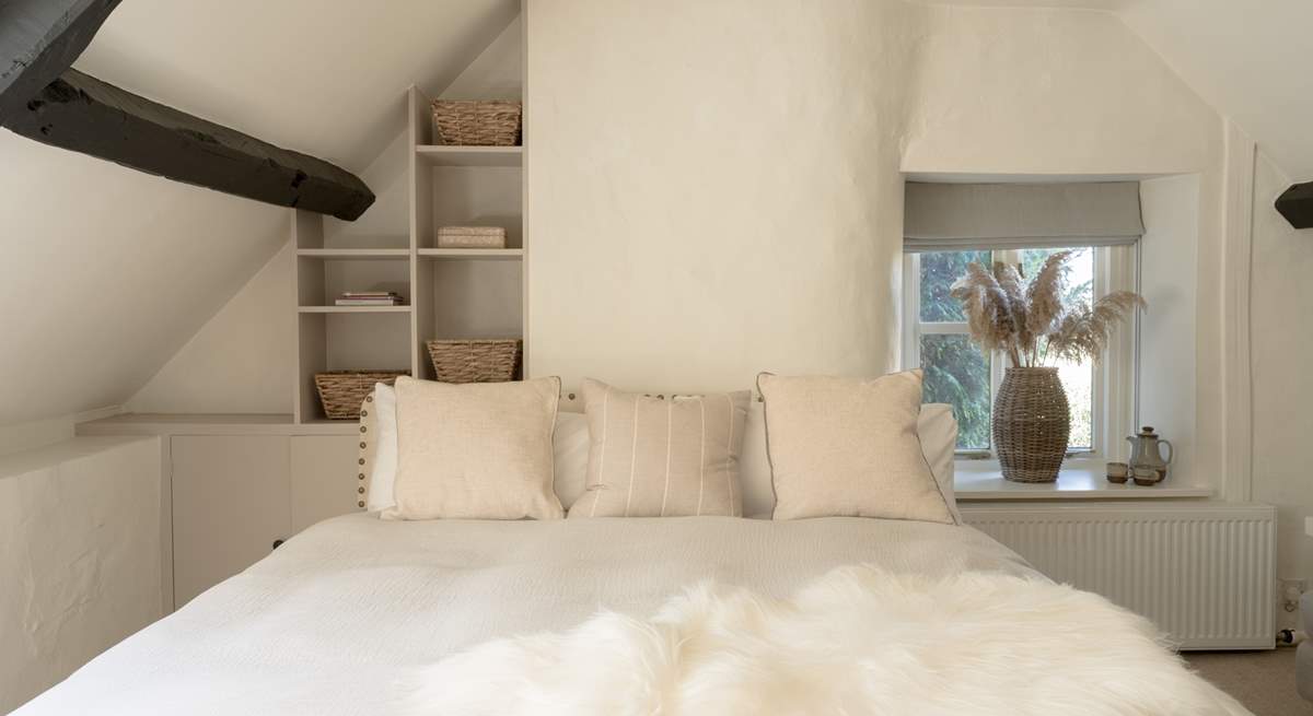 Bedroom 2 beckons you to snuggle up and dream, but please watch the beam! 