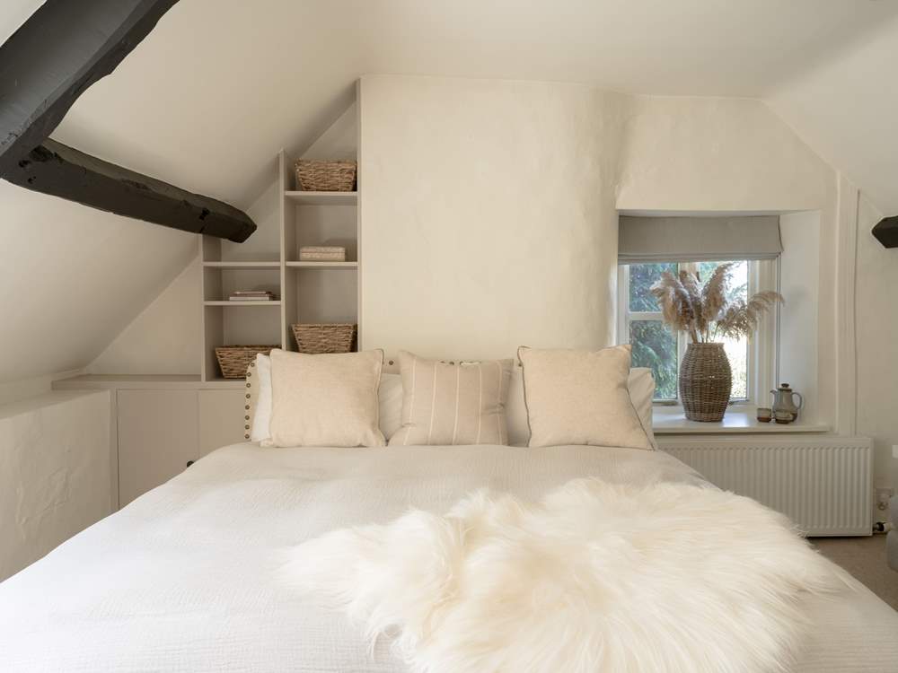 Bedroom 2 beckons you to snuggle up and dream, but please watch the beam!