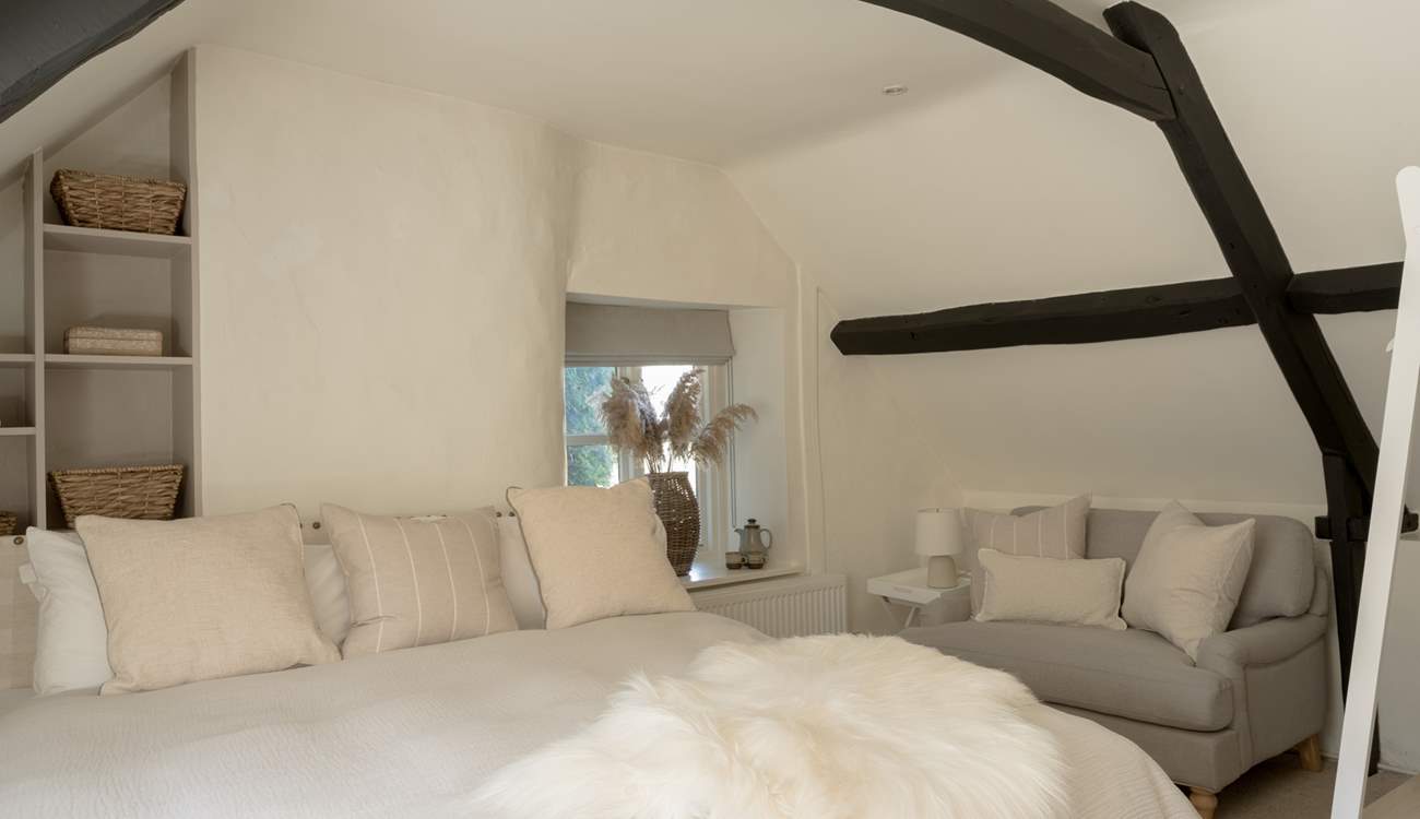 Curl up with a book in the large armchair. 