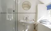 The en suite shower-room to bedroom 1 is a lovely light and sunny room.  - Thumbnail Image