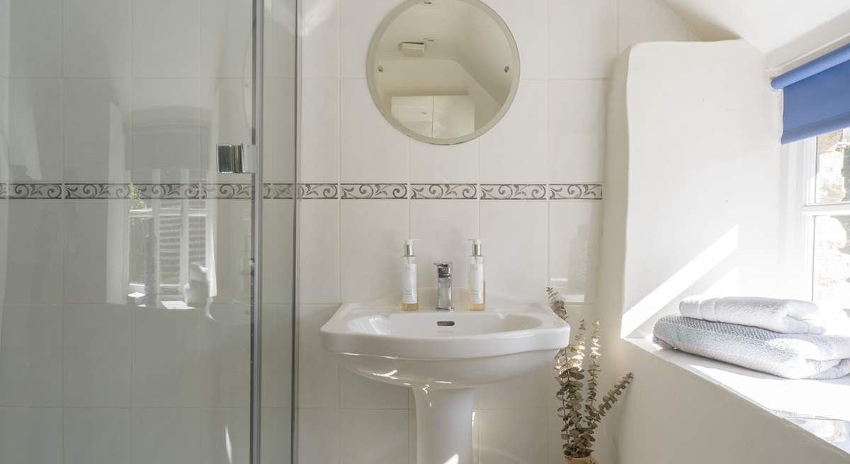 The en suite shower-room to bedroom 1 is a lovely light and sunny room. 