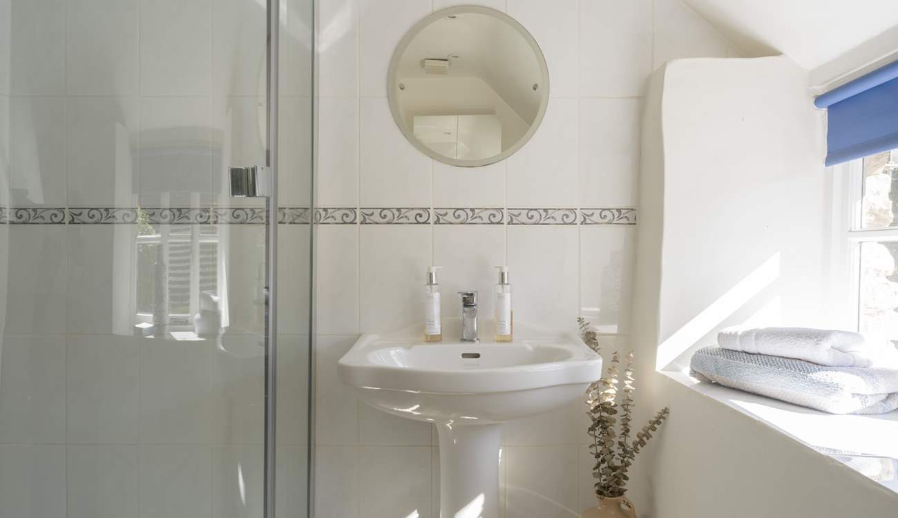 The en suite shower-room to bedroom 1 is a lovely light and sunny room. 