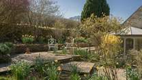 Take a stroll around the beautifully designed garden. 