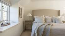 Beautiful linens and squashy duvets add up to a soothing slumber.