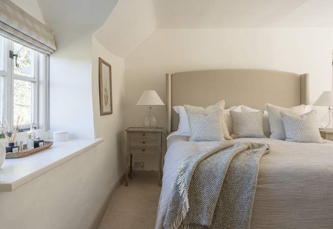 Beautiful linens and squashy duvets add up to a soothing slumber.