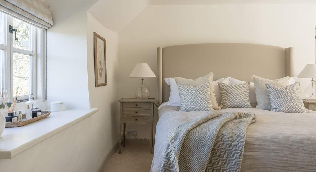 Beautiful linens and squashy duvets add up to a soothing slumber.