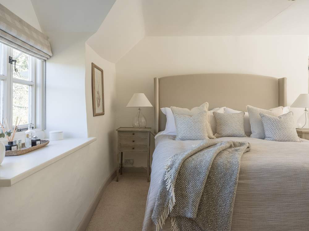 Beautiful linens and squashy duvets add up to a soothing slumber.