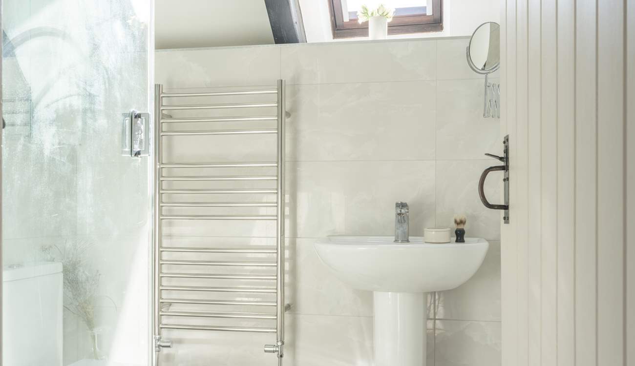 The sun flows in through the Velux window.