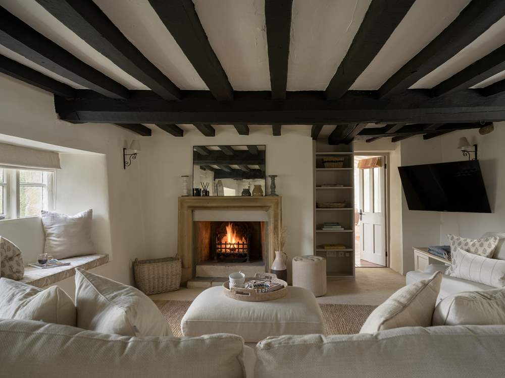 What could be more cosy and relaxing than a crackling fire and a squishy sofa.