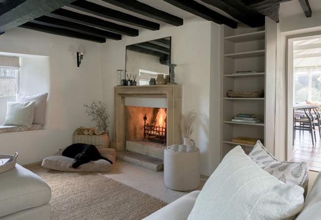 Who gets pride of place by the fire?