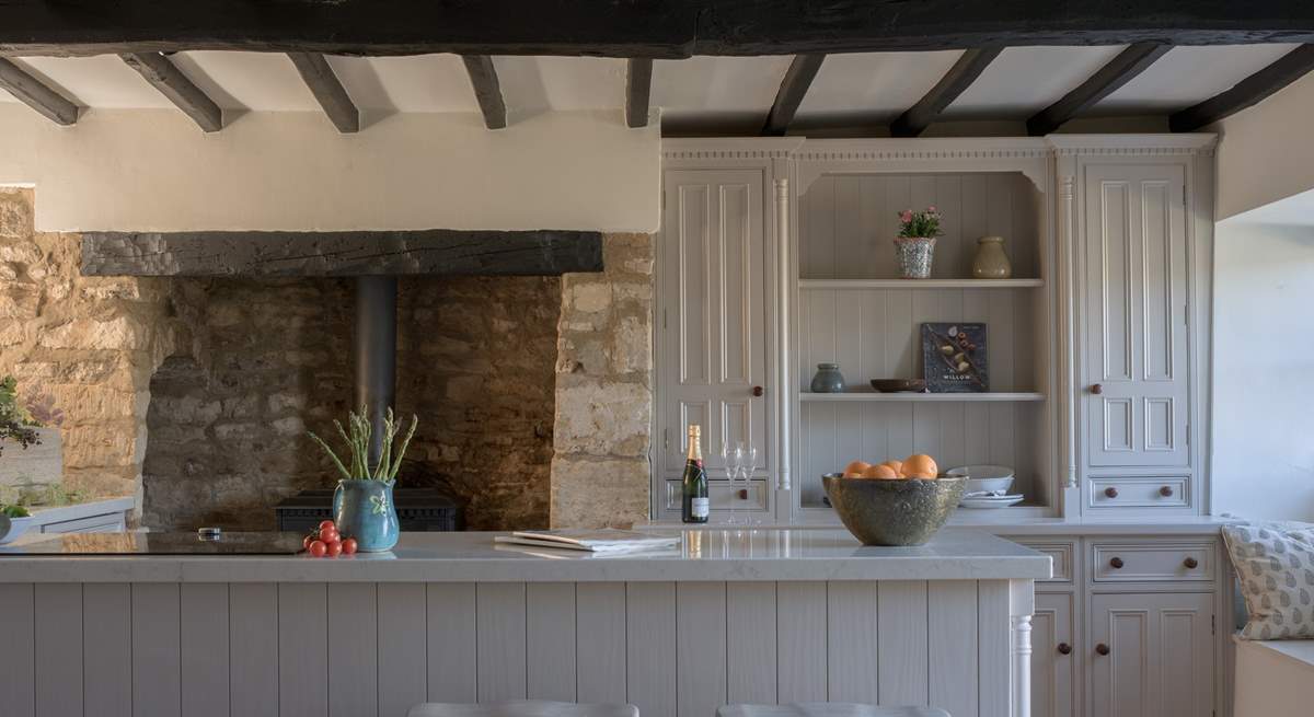 There is even a wood-burner in the kitchen, just look at that inglenook fireplace. 