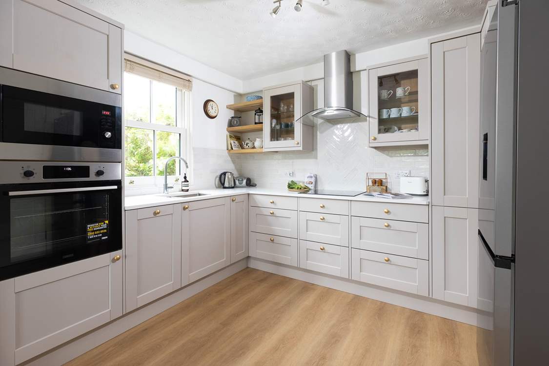 The kitchen/diner is stylish and modern.