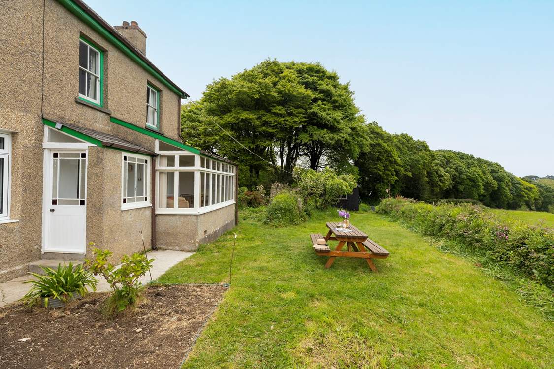 The pretty garden has far reaching views.