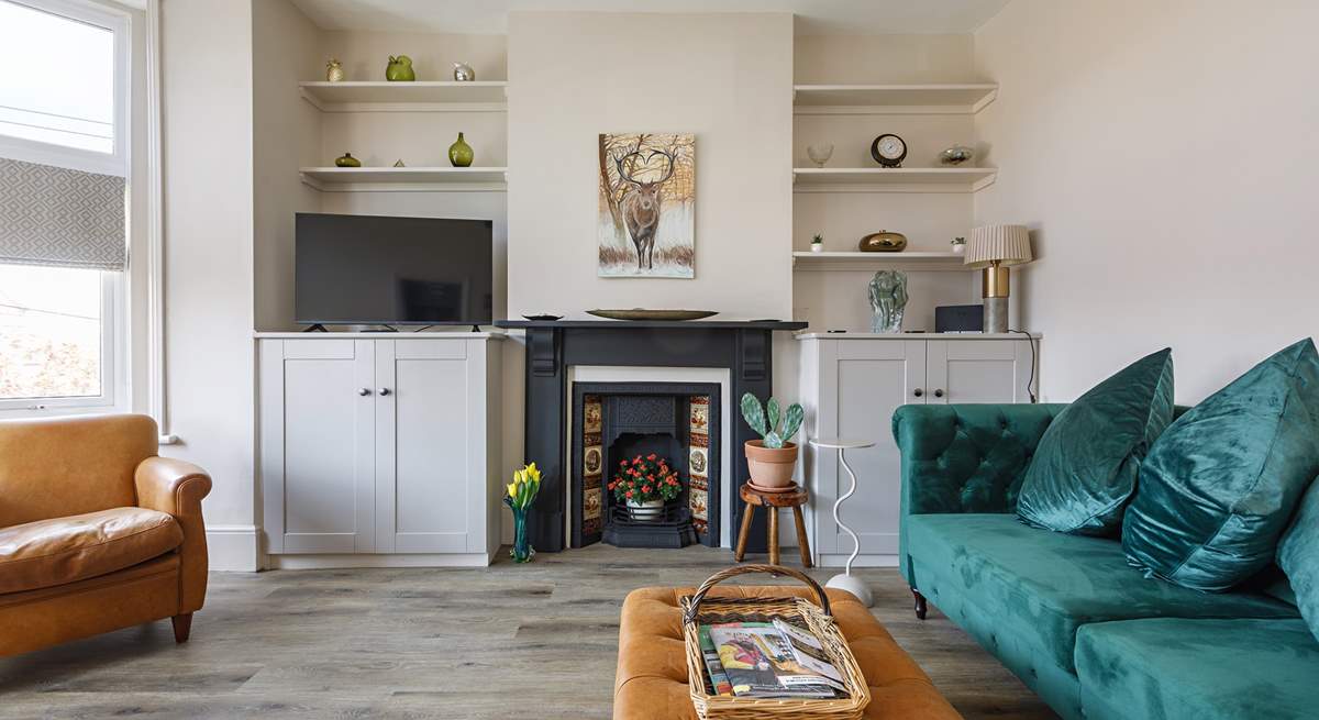 Such a beautiful light-filled room with comfy seating to relax in.