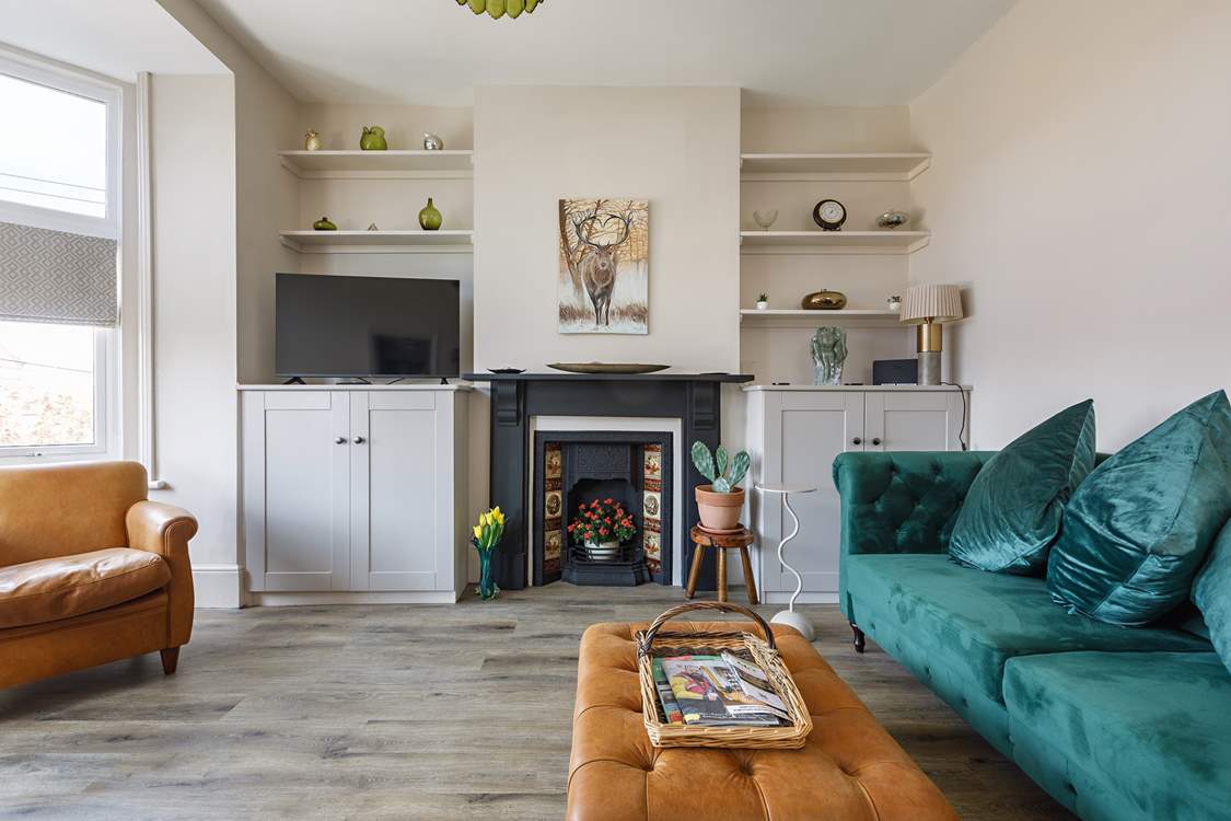 Such a beautiful light-filled room with comfy seating to relax in.