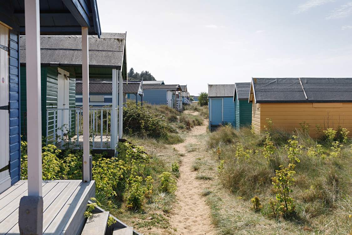 Meander through the pastel beach huts at neighbouring Old Hunstanton beach.