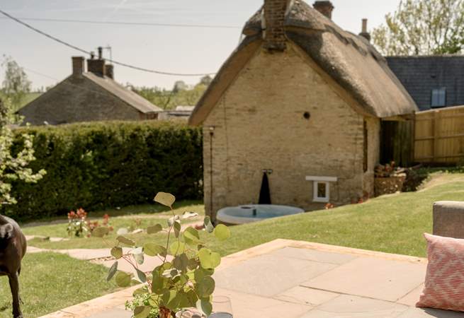 Sit in the sun on the raised patio and relax. 