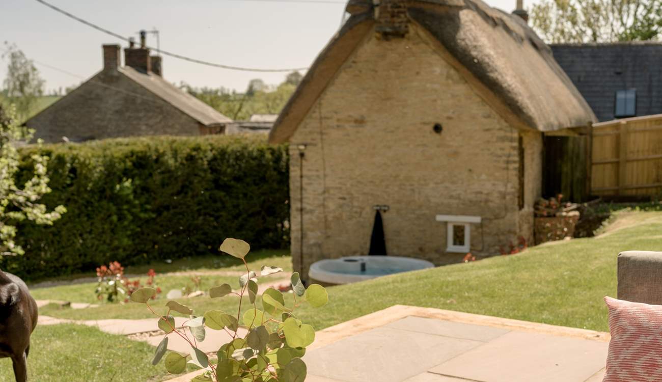 Sit in the sun on the raised patio and relax. 