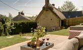 Pure relaxation on the comfy outdoor seating. - Thumbnail Image
