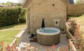 Relax in the hot tub at any time of year.  - Thumbnail Image