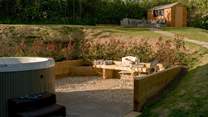 Enjoy an al fresco snack by the hot tub. 