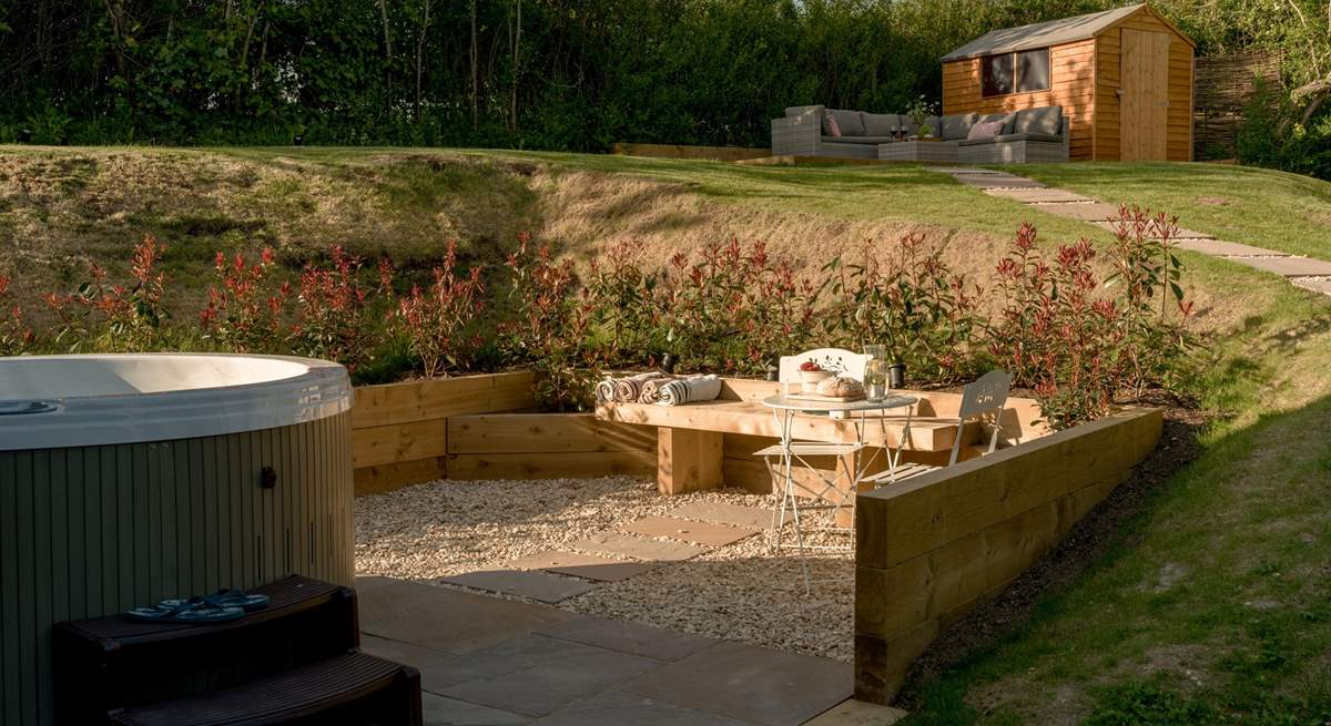 Enjoy an al fresco snack by the hot tub. 